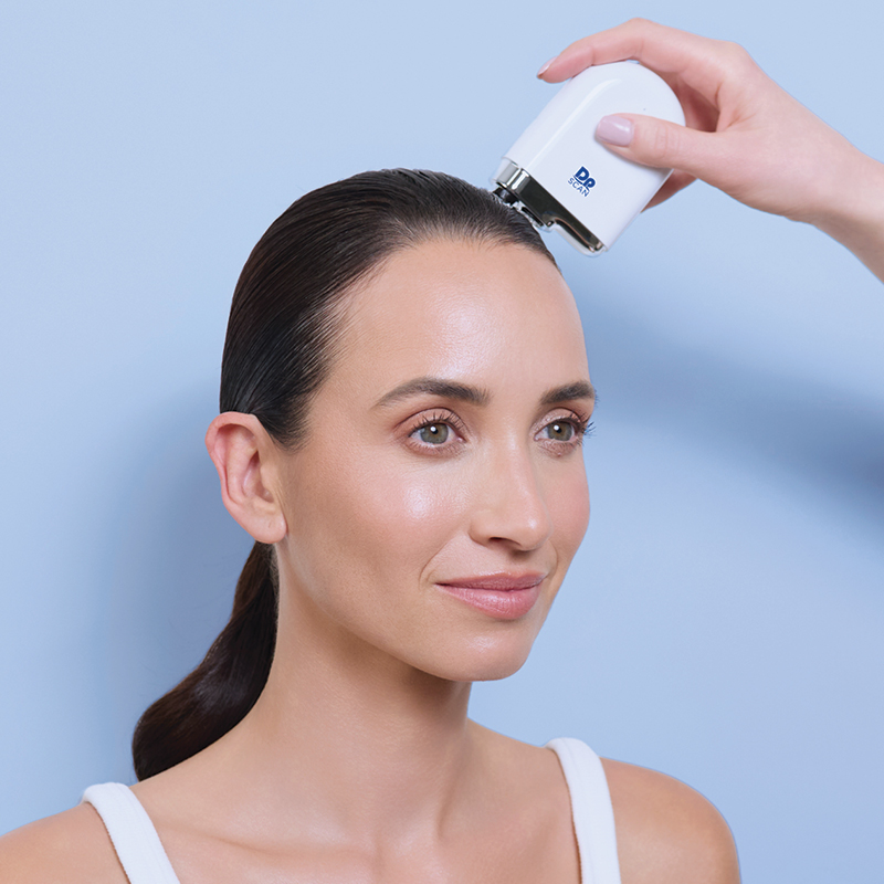 Dp SCAN device being used on model