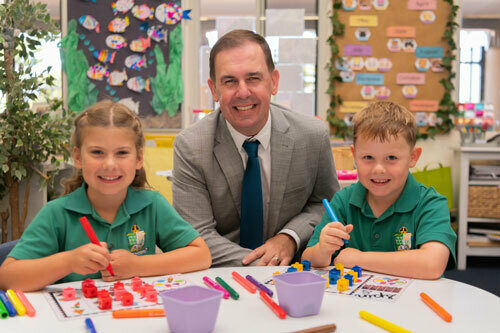 PMACS Principal Benjamin Lomas with Students