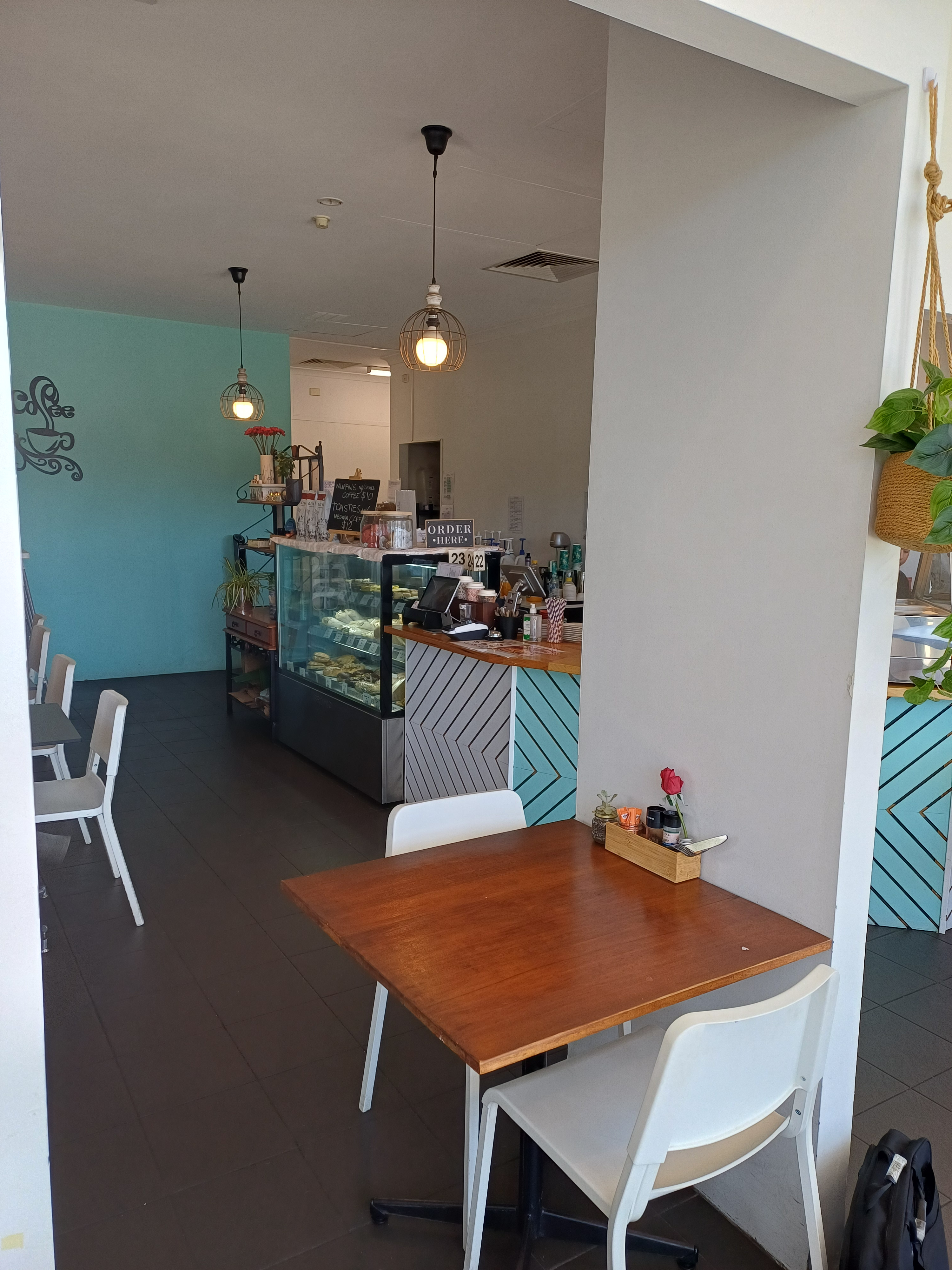 Thriving Caf with Drive-Through in Prime Shopping Centre Location - For Sale!