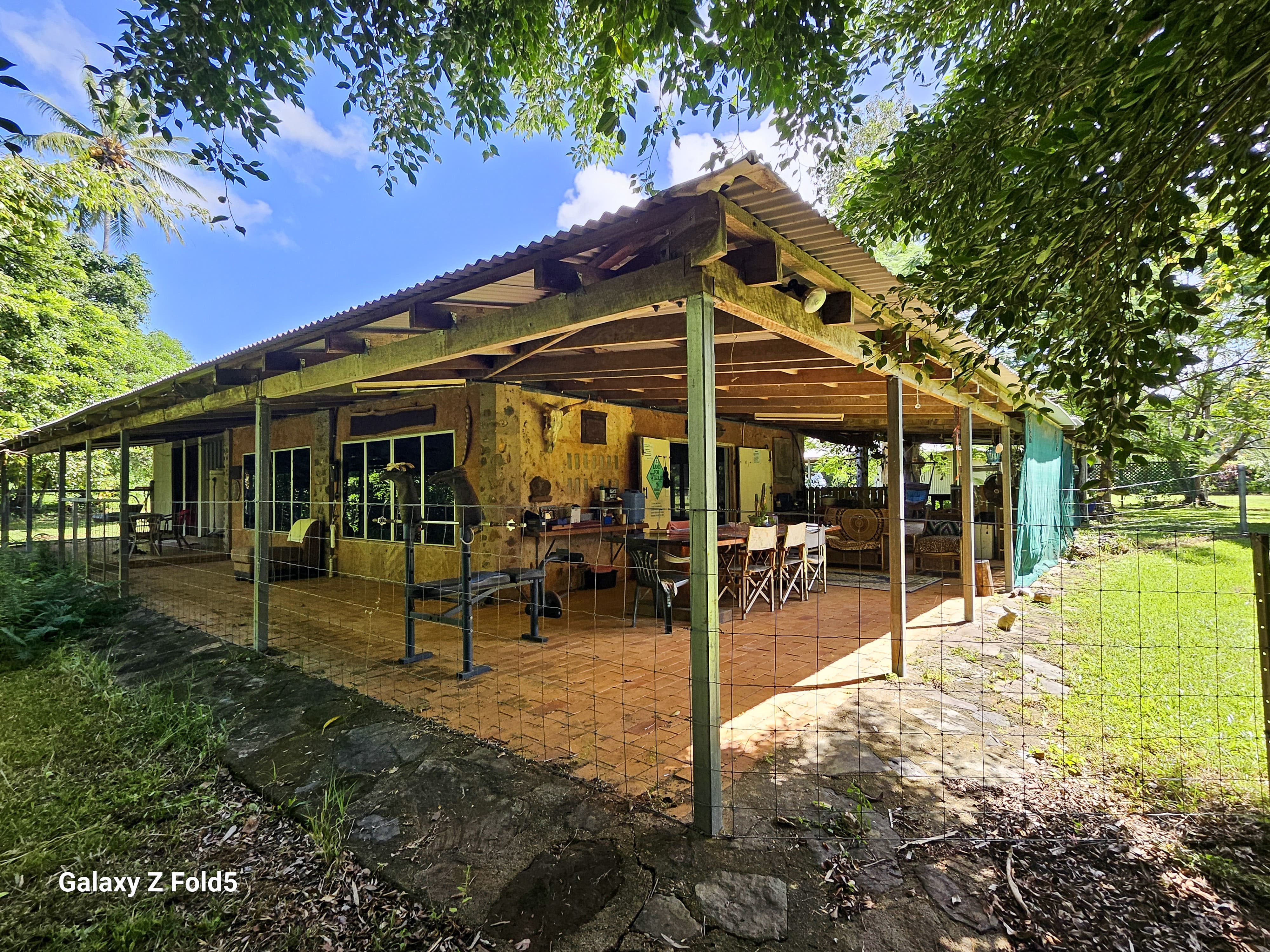 Unique Acreage Retreat with Creekside Lifestyle & Rare River Access
