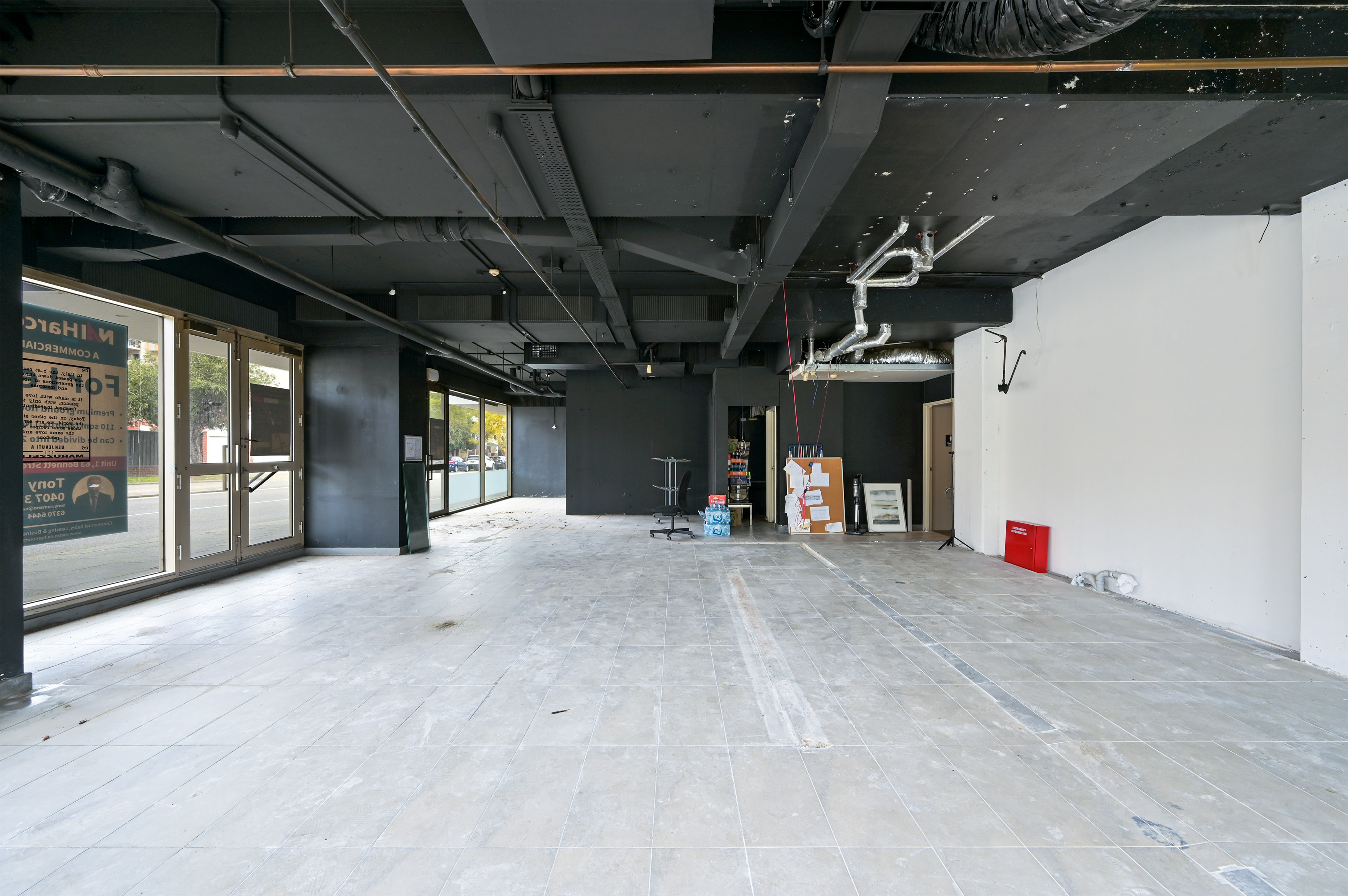 Prominent Corner Tenancy with Extensive Street Frontage