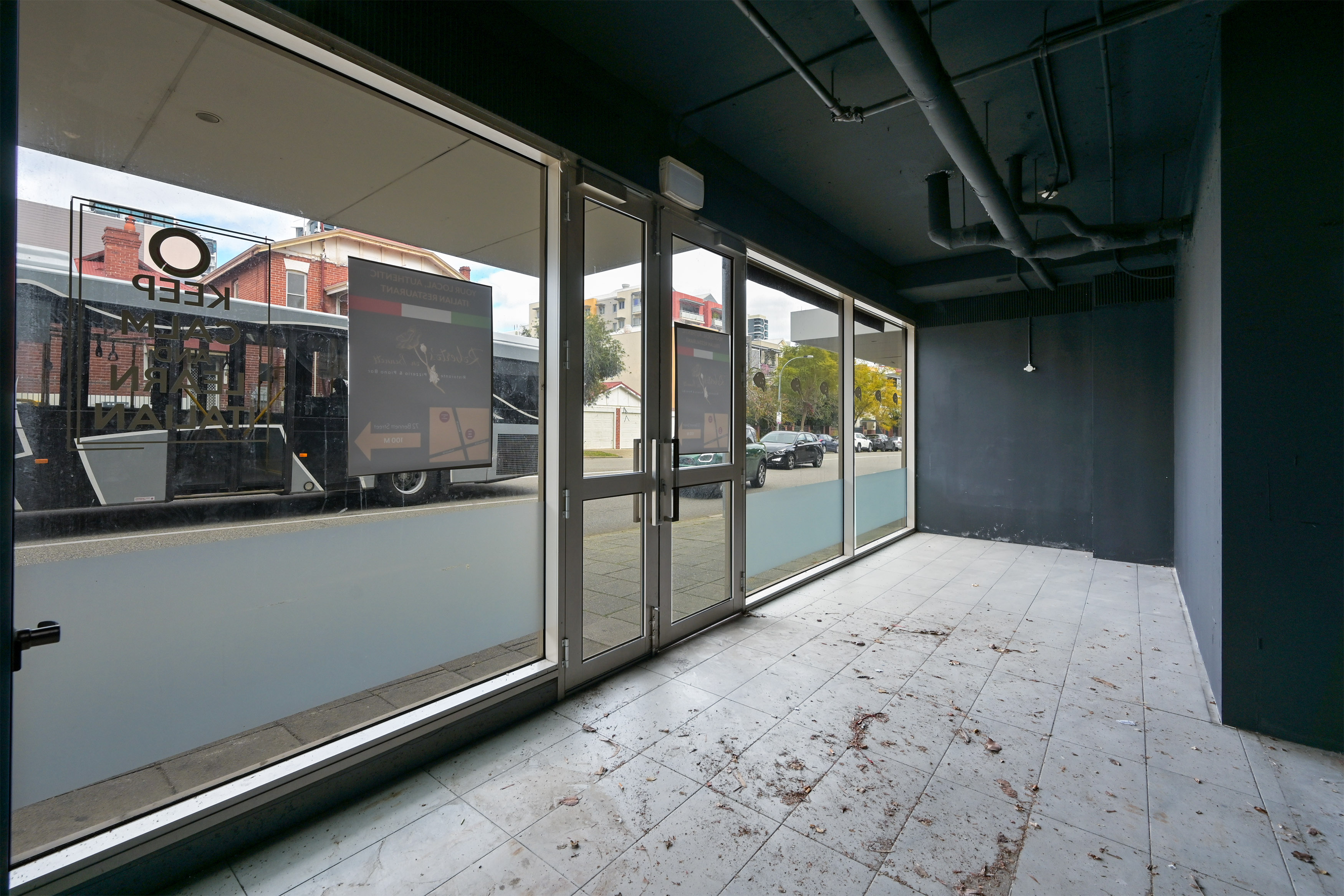 Prominent Corner Tenancy with Extensive Street Frontage