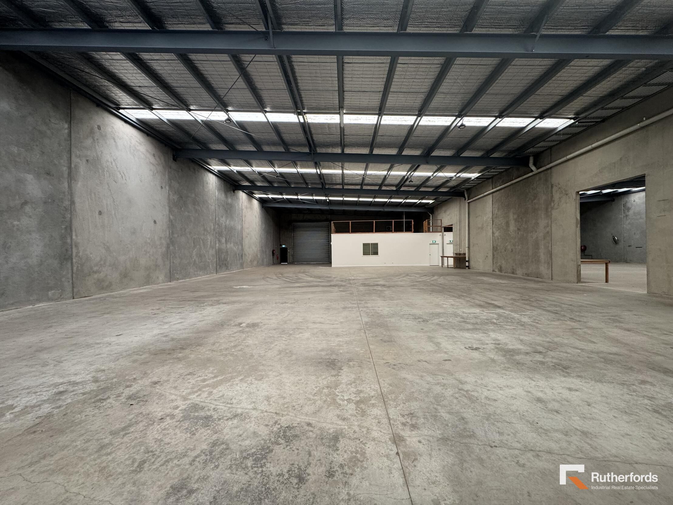 Versatile Industrial Facility with Ample Yard, Parking & Dual Access!!