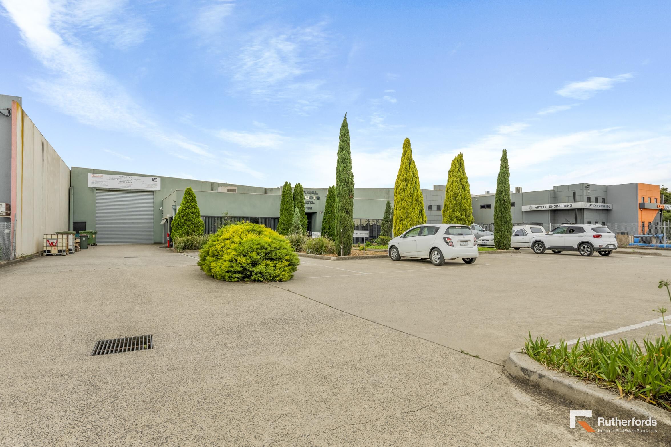 Versatile Industrial Facility with Ample Yard, Parking & Dual Access!!
