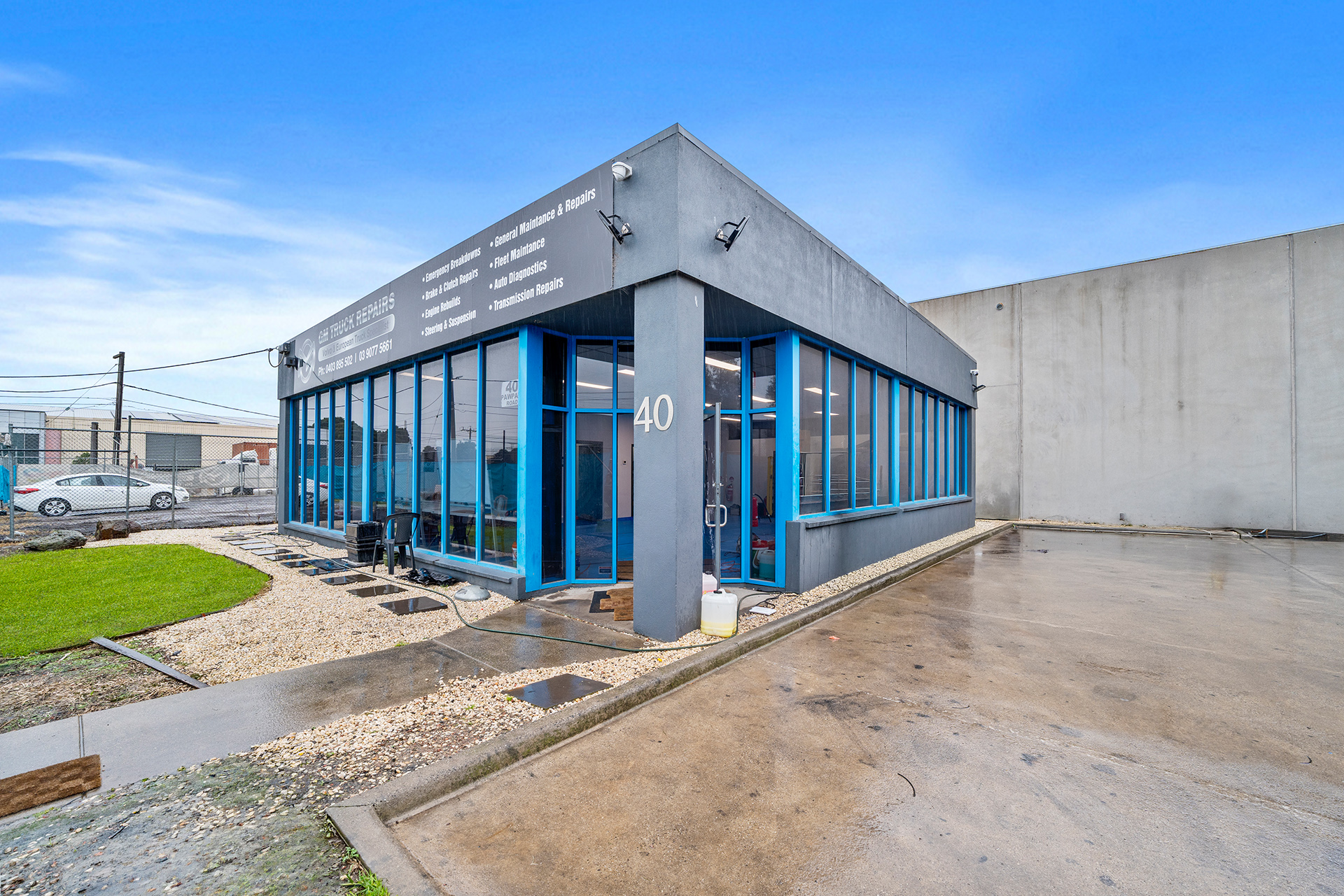 PROMINENT CORNER WITH OFFICE, YARD AND FREEWAY ACCESS.