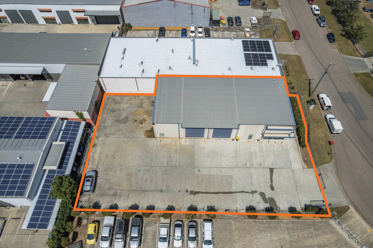 Freestanding industrial facility with office and secure hardstand