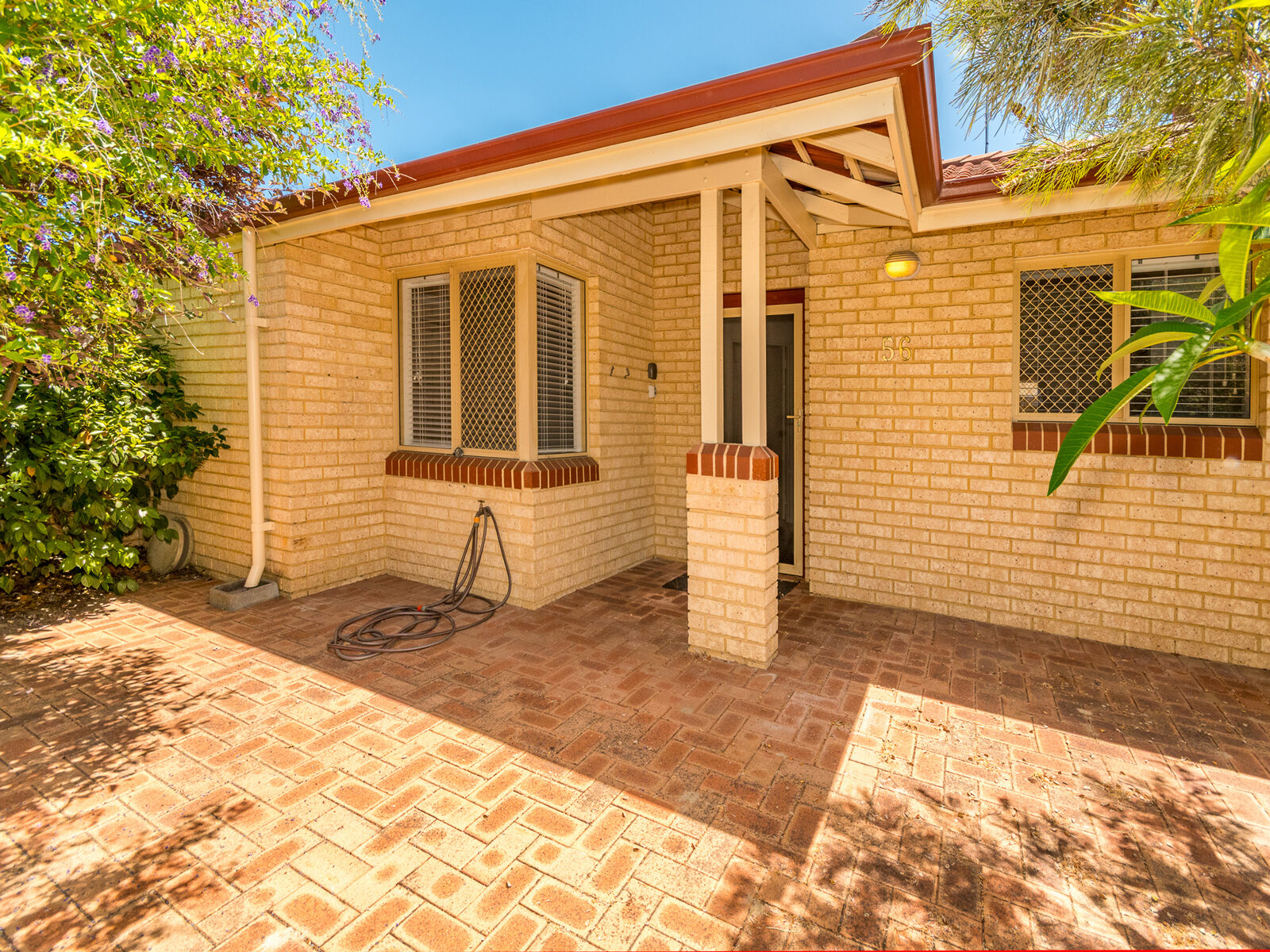 Villa 56 is set in a Quiet Location with a Large Walled Front Garden with Established Plants & a Private Rear Courtyard