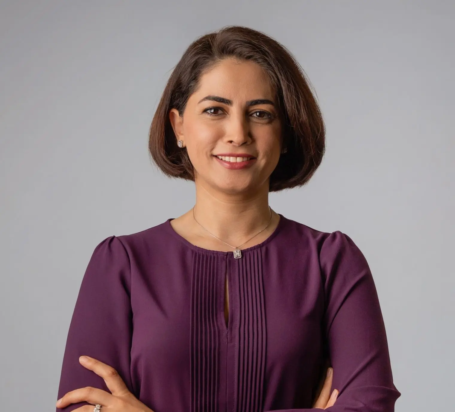 Dr. Fatemeh Ahmadi, smiling in professional attire.