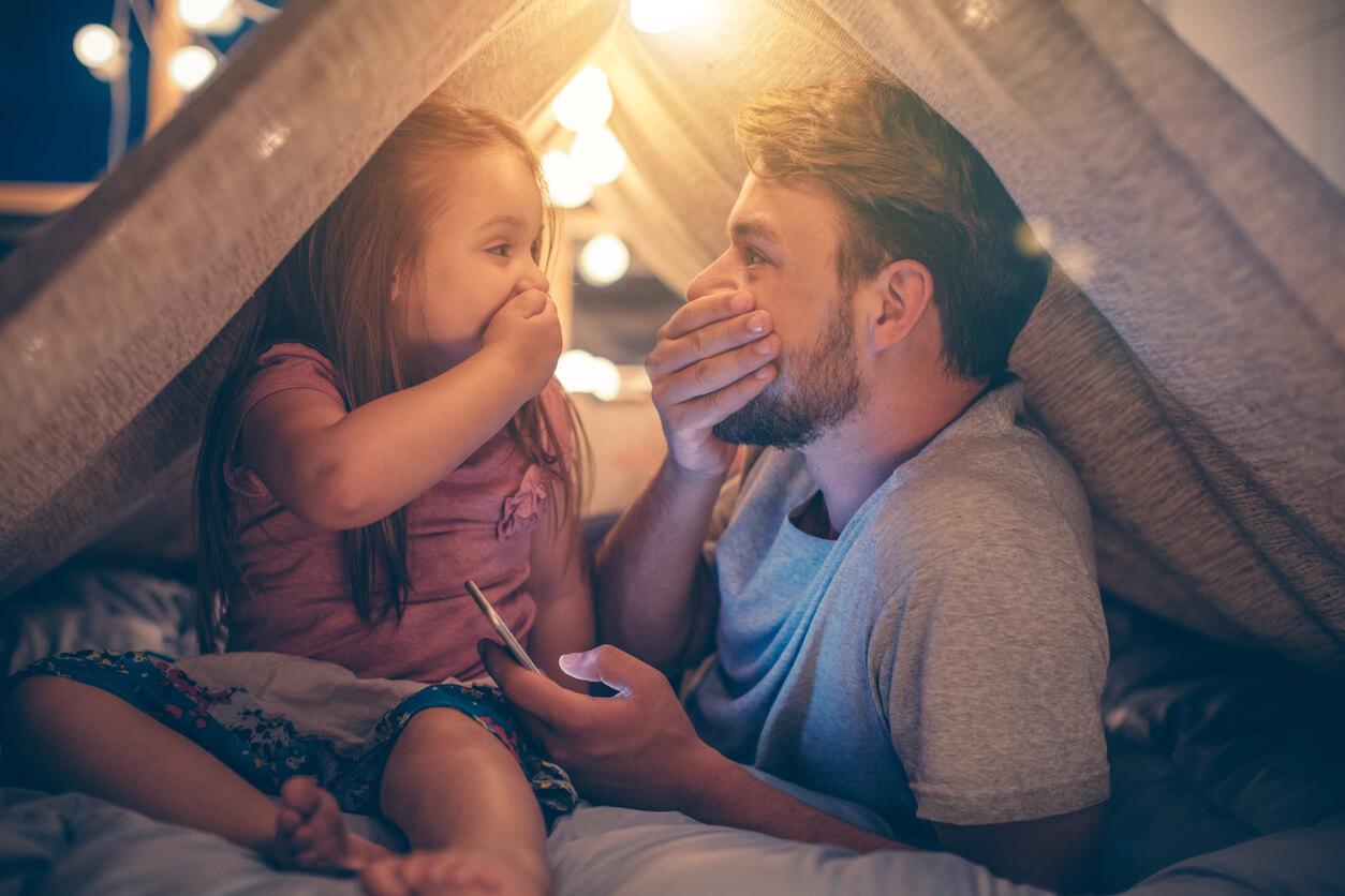 Father and daughter sharing a joke