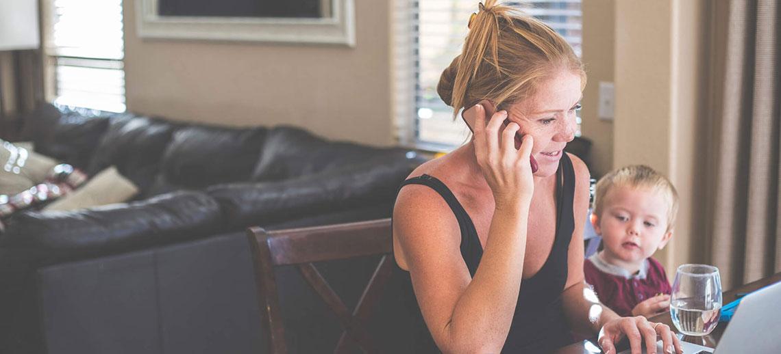 A mother working from home