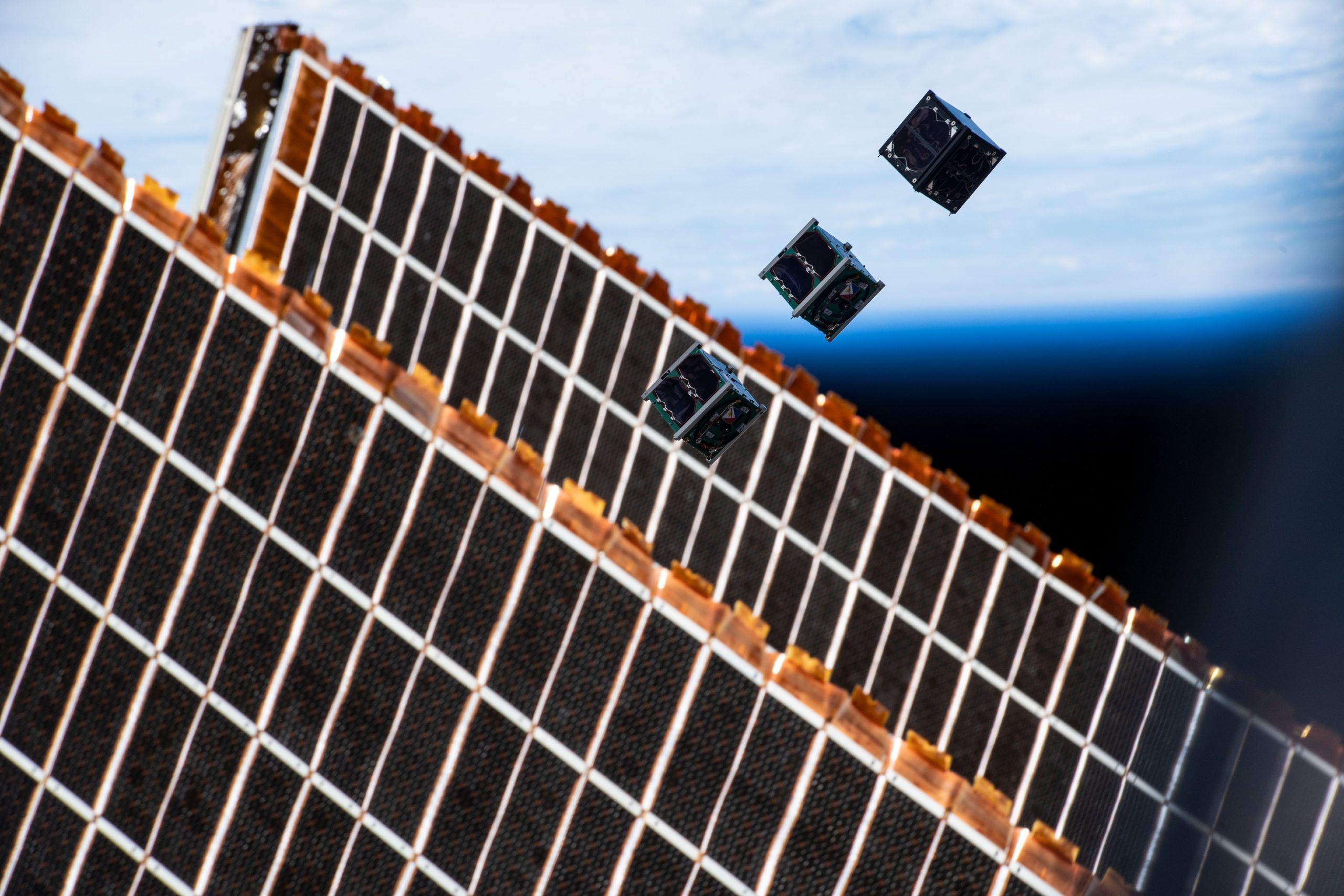 Binar-1, built by the Binar Space Program becomes the first satellite designed and built in Western Australia to be deployed into low earth orbit from the International Space Station in 2021. (Also pictured: Maya-3 and Maya-4 built by University of the Philippines Diliman). Image Credit: NASA/JAXA