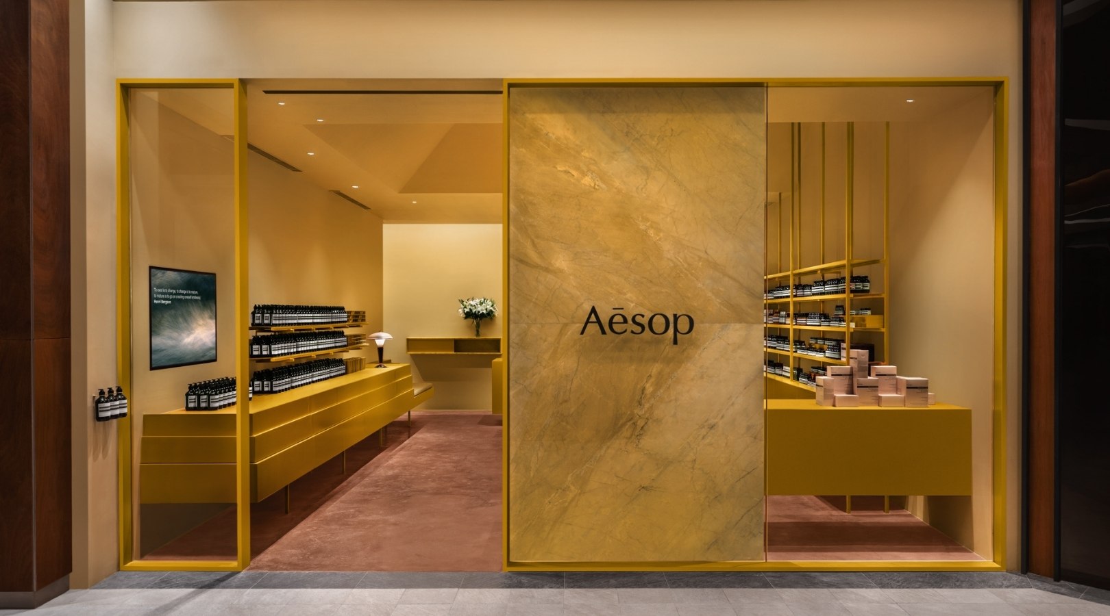 Aesop Rockwell's store facade featuring neutral minimalist decor.