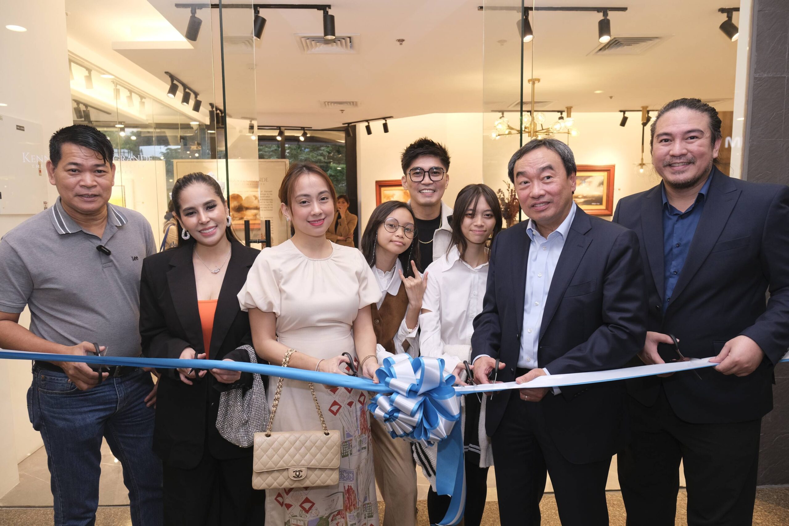 The ribbon-cutting for Kenneth Montegrande's "The Greatness of Simplicity." Photo by Ed Simon.