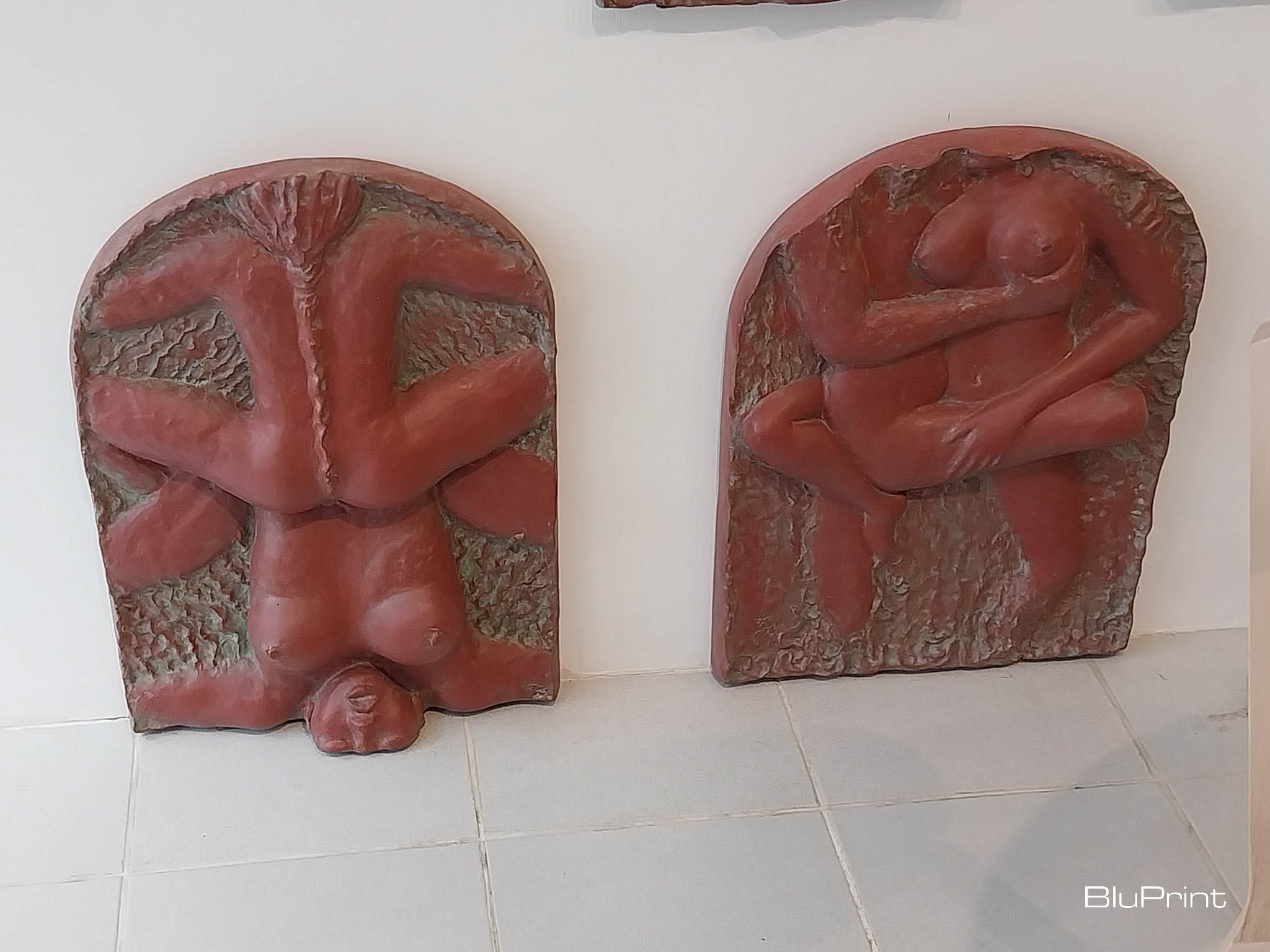 Sculptures in the bottom of the wall exhibit depicting sex acts. Photo by Elle Yap.