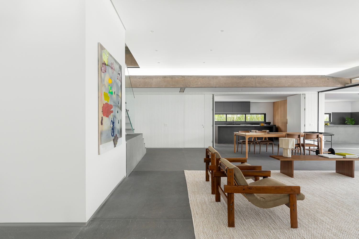 Staircase by the living room area. Photo by Júlia Tótoli.