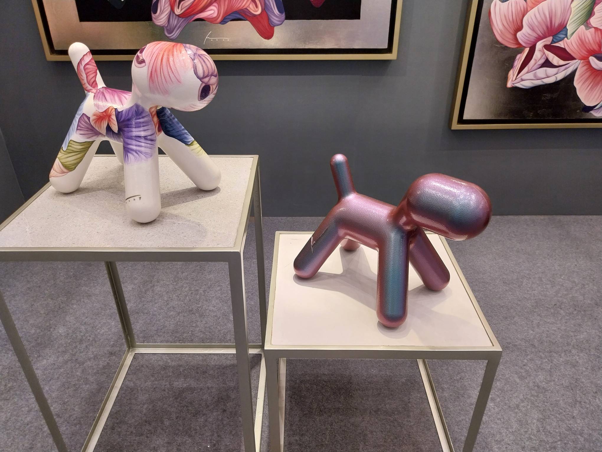 Two balloon-animal-dog-like sculptures. Photo by Elle Yap.