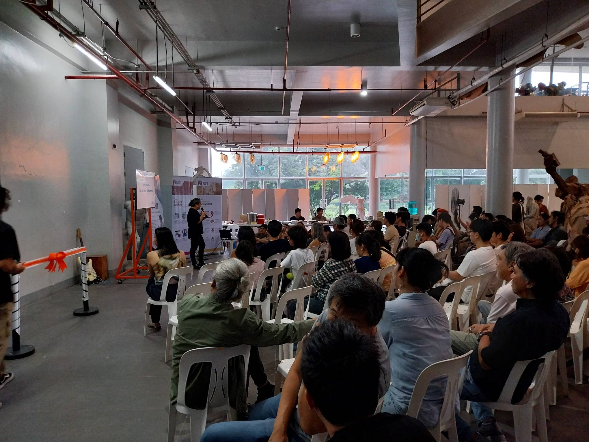 Crowds of families, students, and guests at the Avante: Industrial Design Thesis Exhibit opening ceremony.