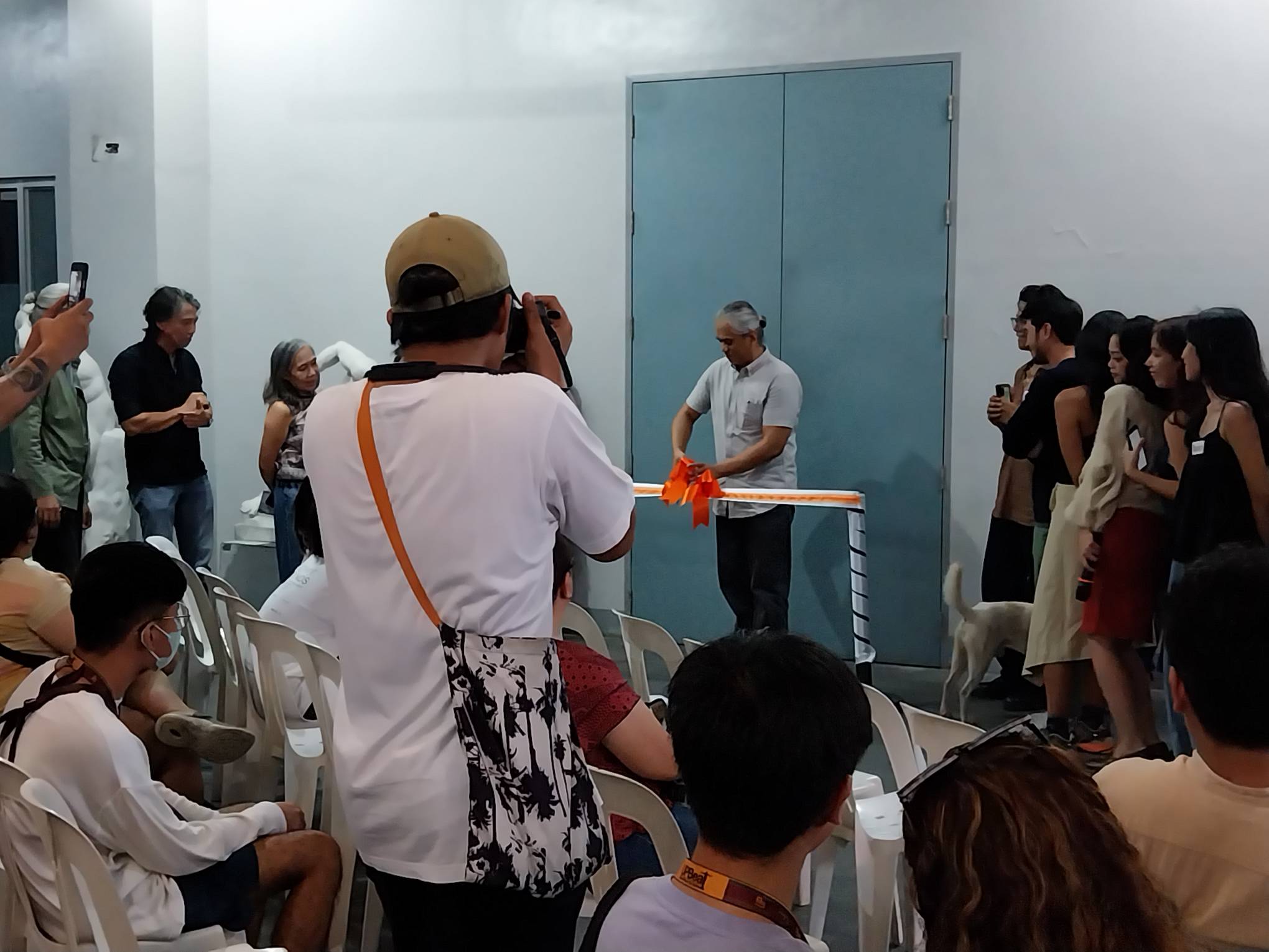 The ribbon-cutting ceremony of the Avante: Industrial Design Thesis Exhibit. Photo by Elle Yap.