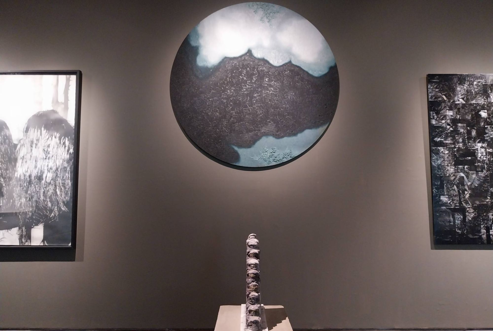 Lui Medina’s painting “Untitled (After Metamorphic Histories) III” and Christina Quisumbing Ramilo’s “Slaughter of the Innocents” for Artinformal's new exhibit. Photo by Elle Yap.