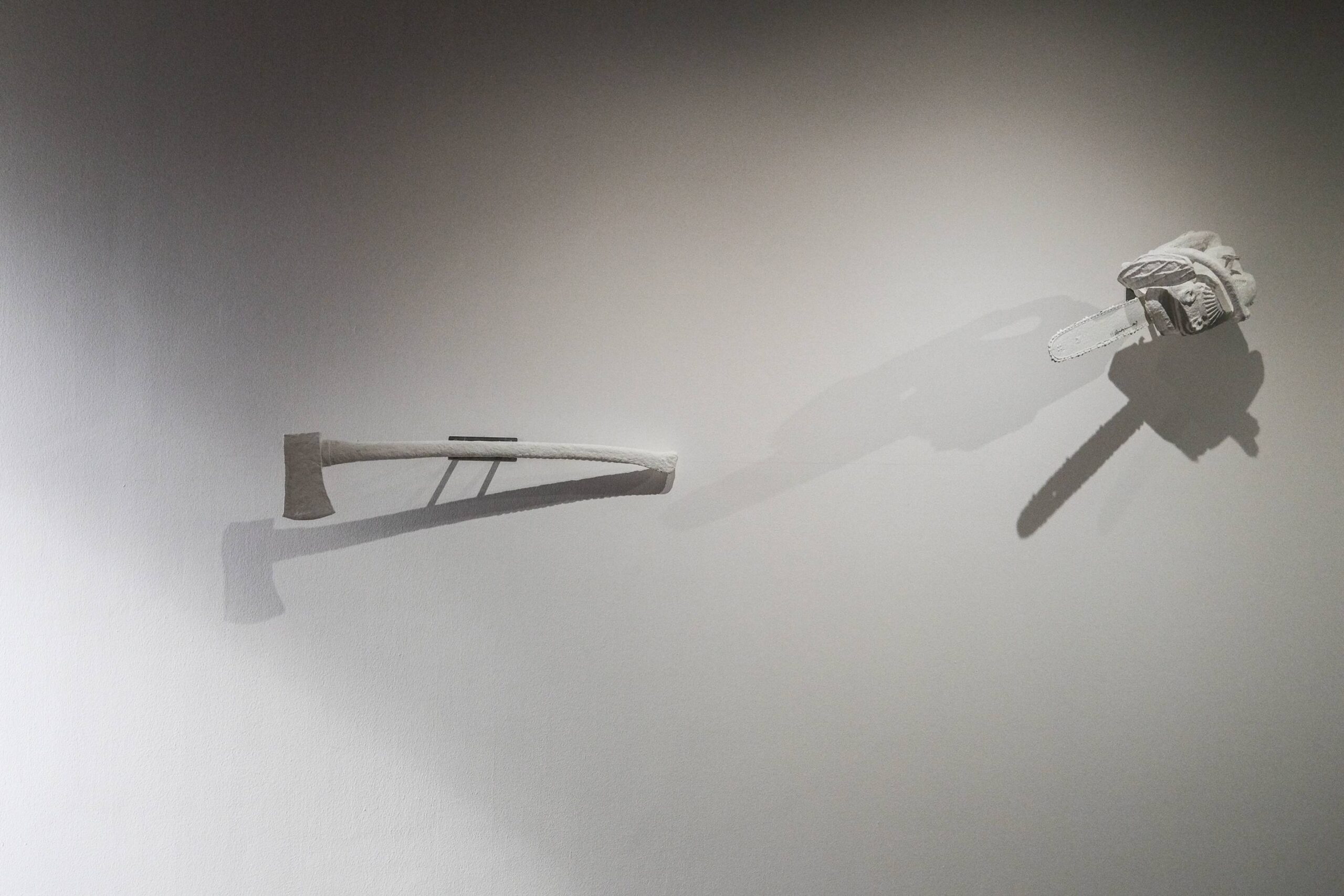 Paper and wood mixed media works by the Aquilizans. Photo by Ed Simon.