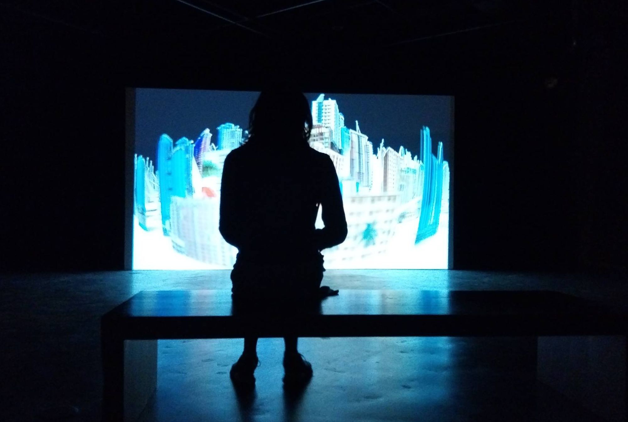 A person looking at the video feed for 