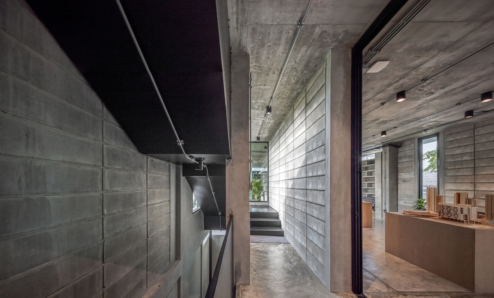 The narrow stairwell of the Concrete Collage Office. Photo by Witsawarut Kekinna.