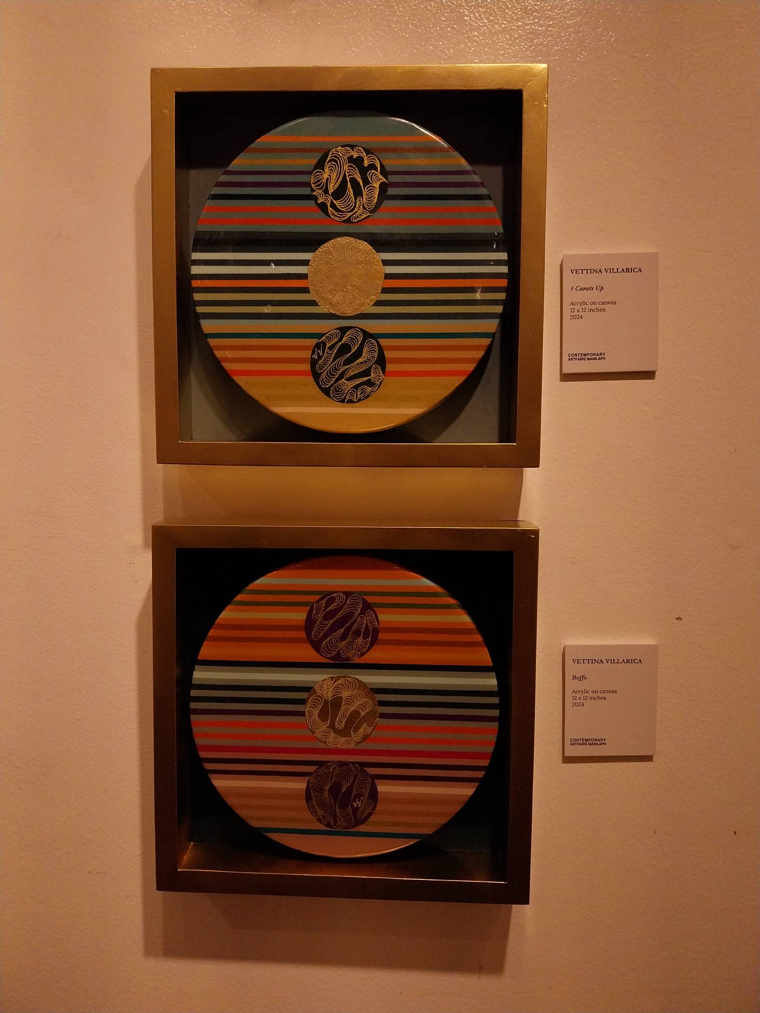 Two paintings by Vettina Villarica.