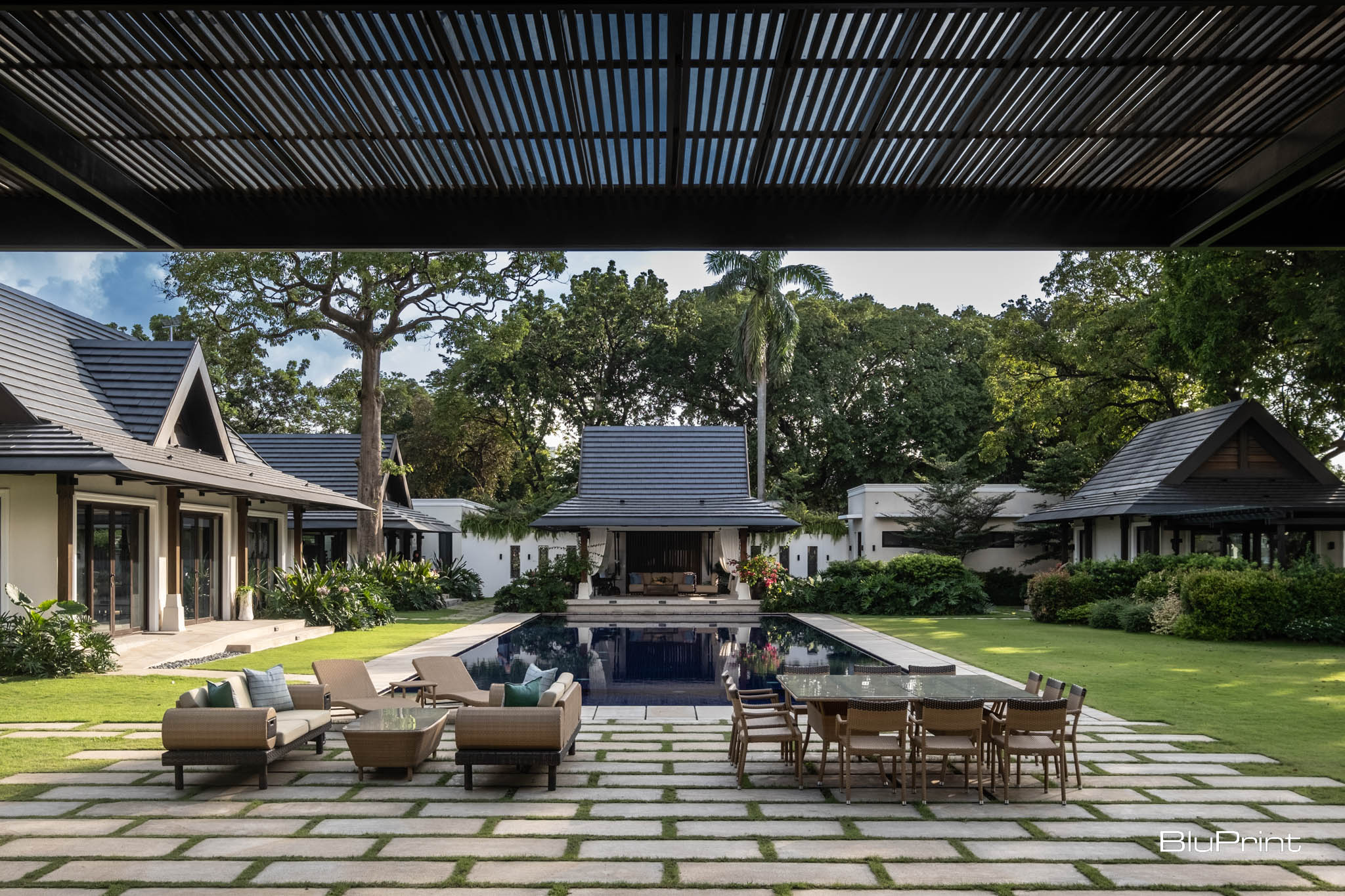 View of the pool area from the main house at Bahay Pangulo.