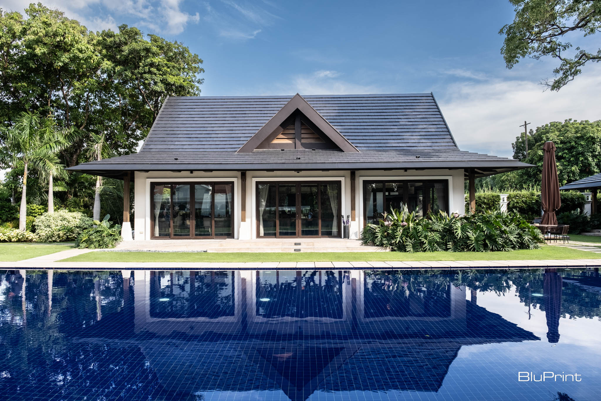 View of the pavilion from the other side of the pool.