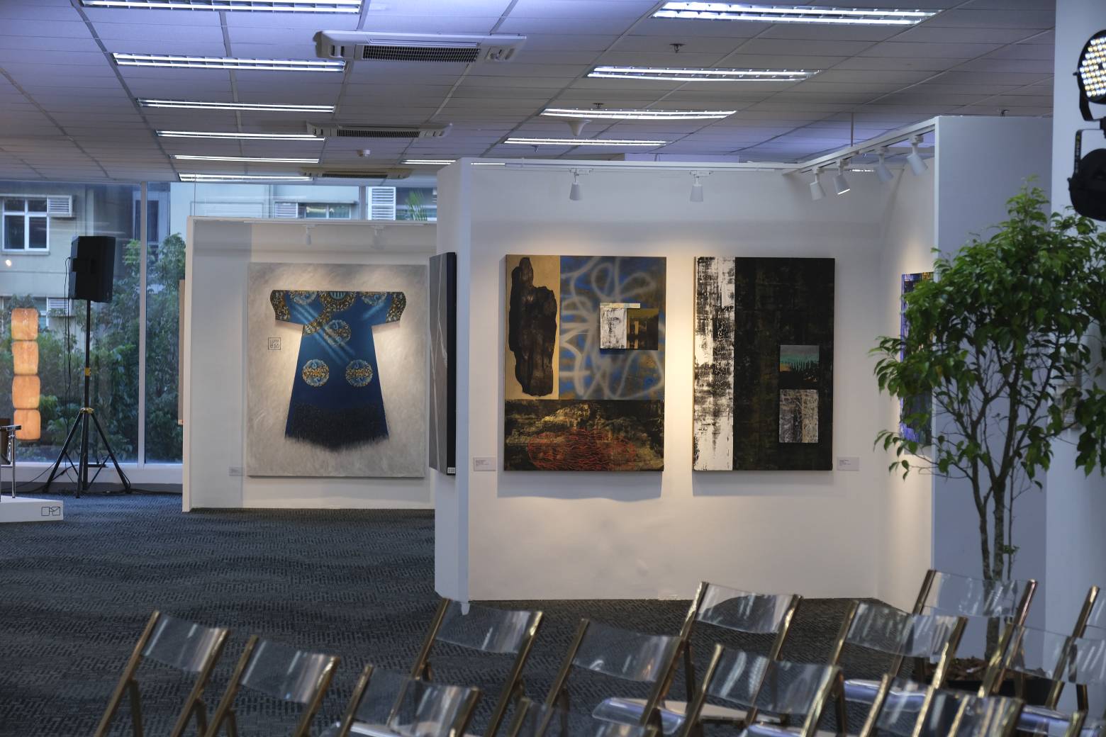 Artworks at ICA Art Fair, including a painting by Winna Go.