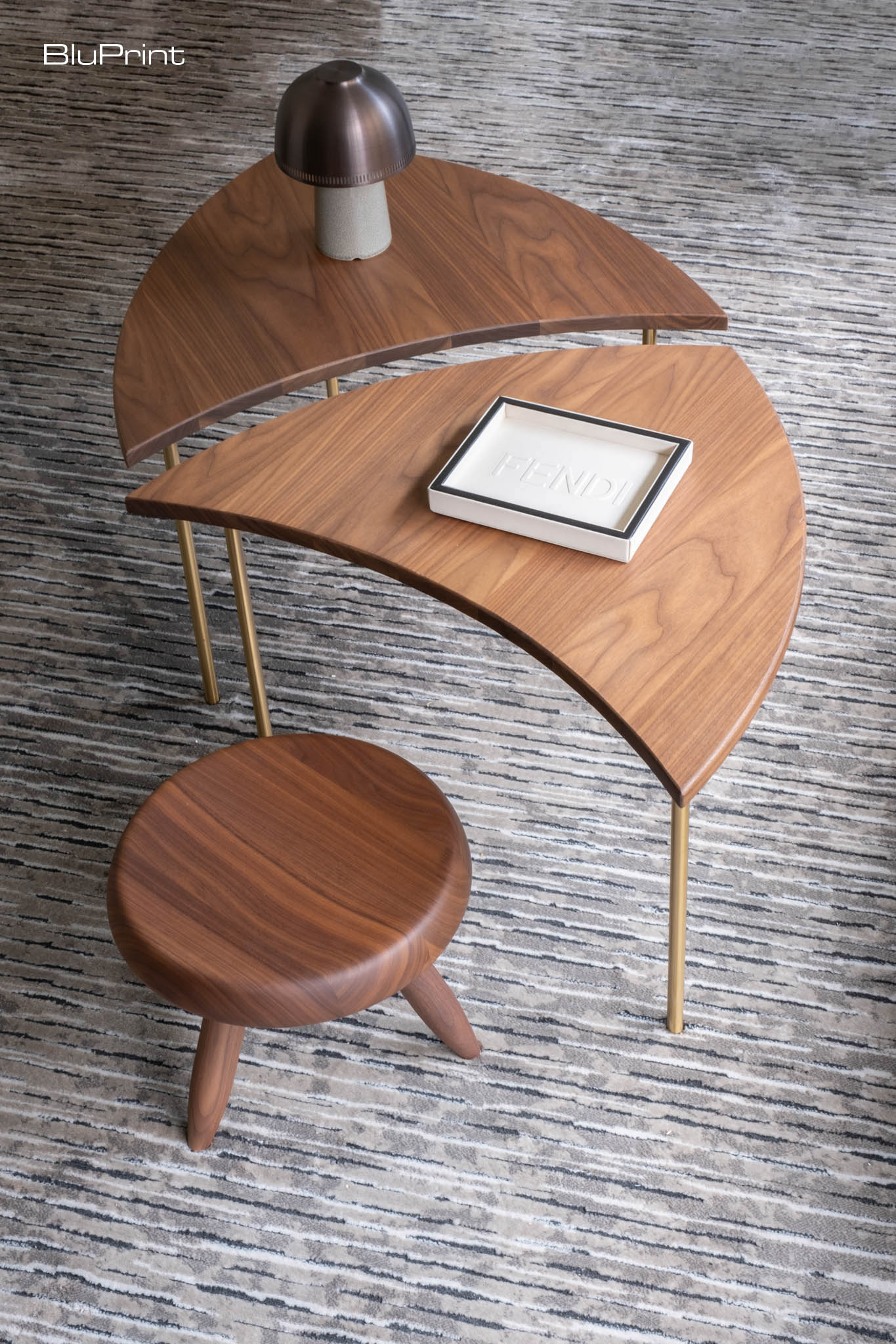 Detailed shot of a coffee table and wooden stool.