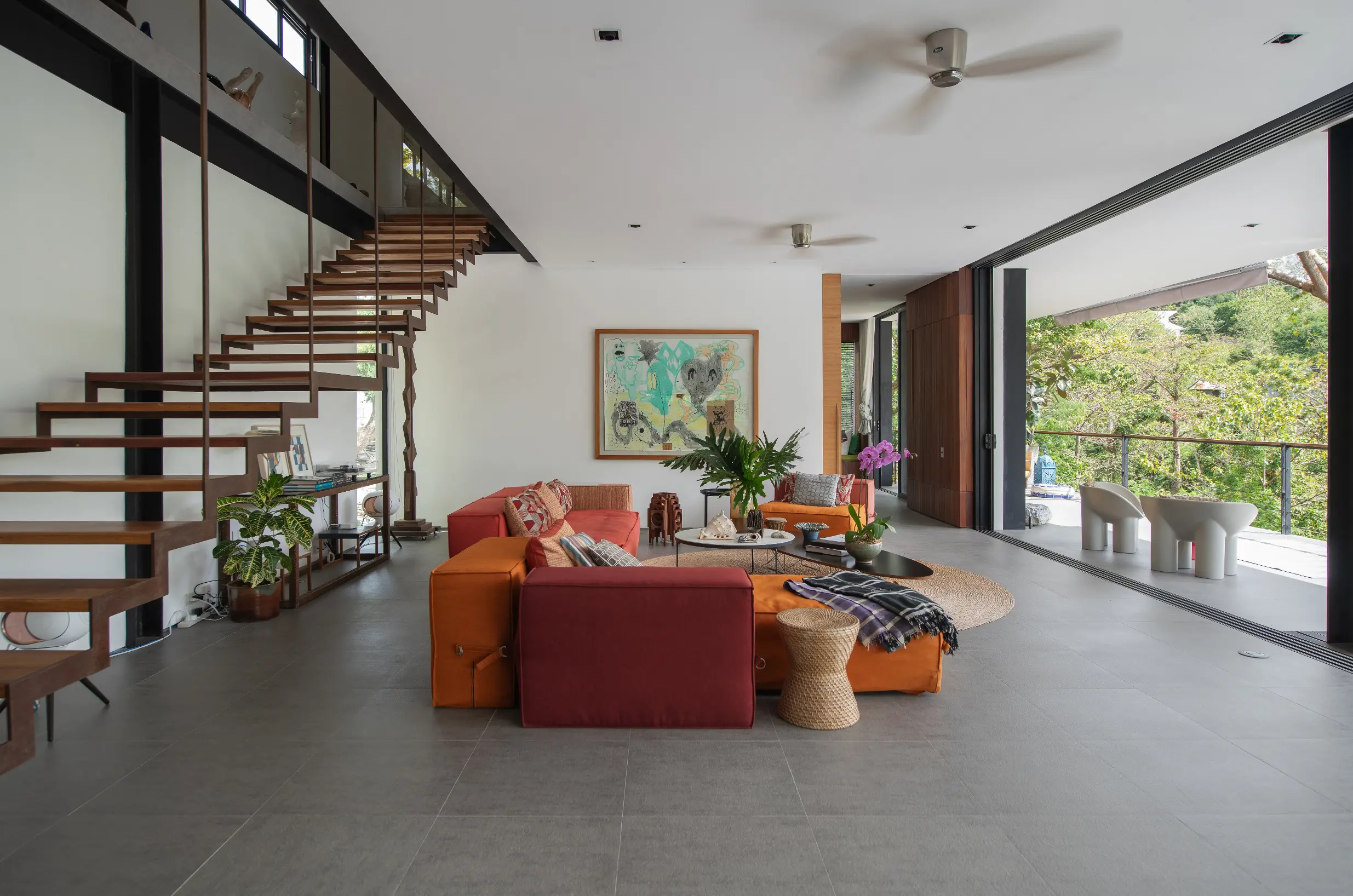 The living area of the house, with a view of the surrounding nature. 