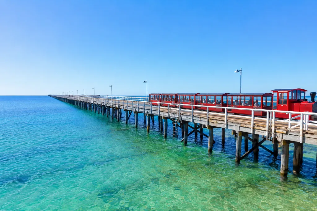 The iconic Busselton Jetty stretching over turquoise water