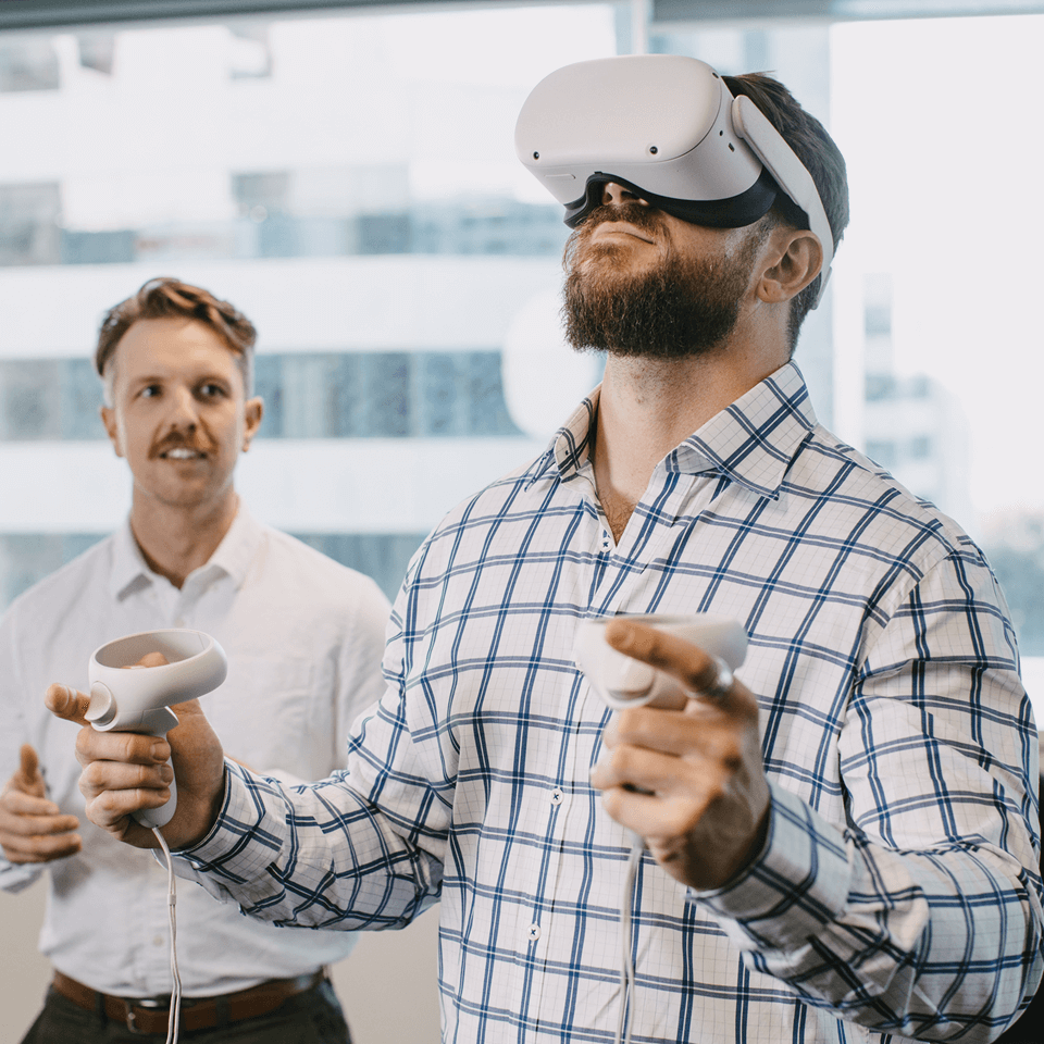 Employees are demonstrating the AR/VR technology