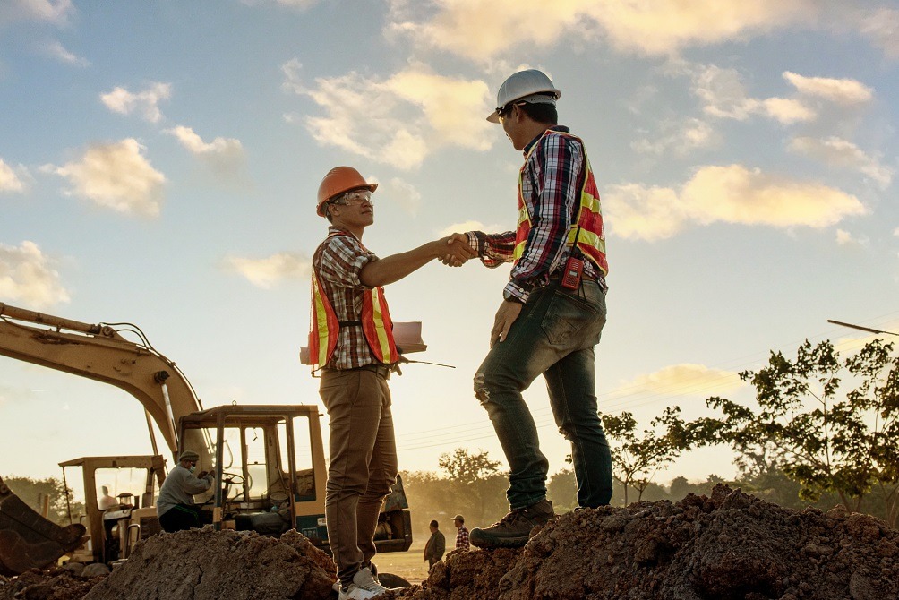 engineers-discussion-with-architects-work-planing-construction-site