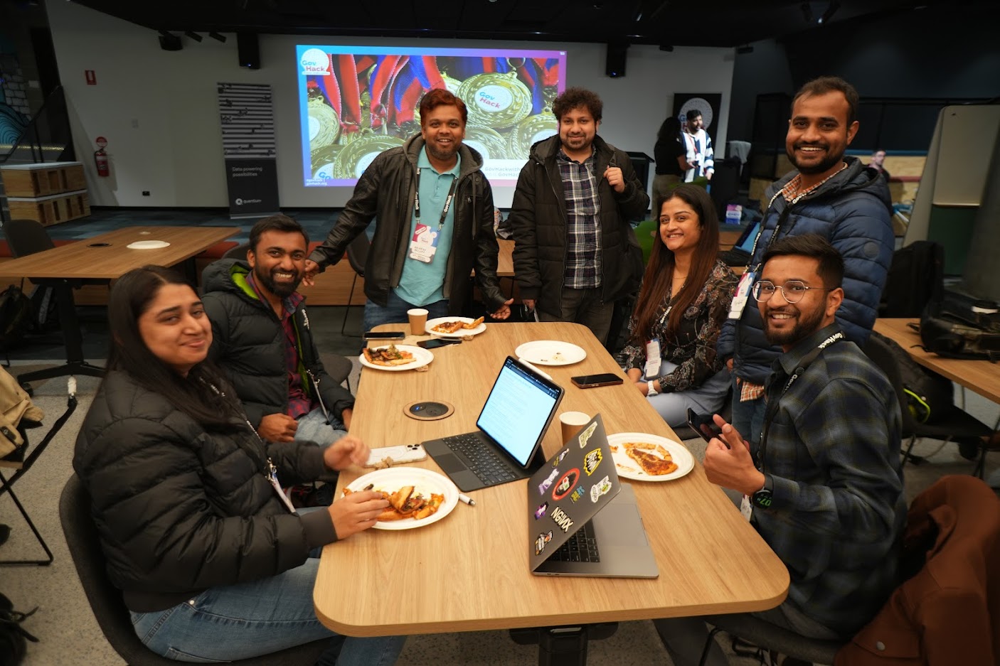 Team in Melbourne posing for photo in Infosys space