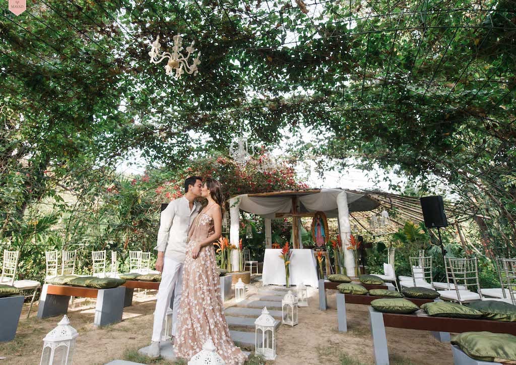 The setup of the Catholic blessing in the Club Paradise chapel. Dress by Mia Arcenas