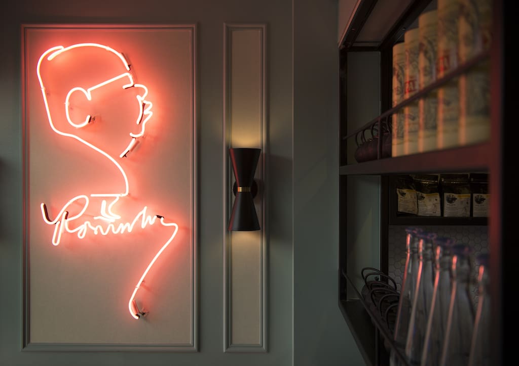 A neon logo at the Romulo Cafe in London