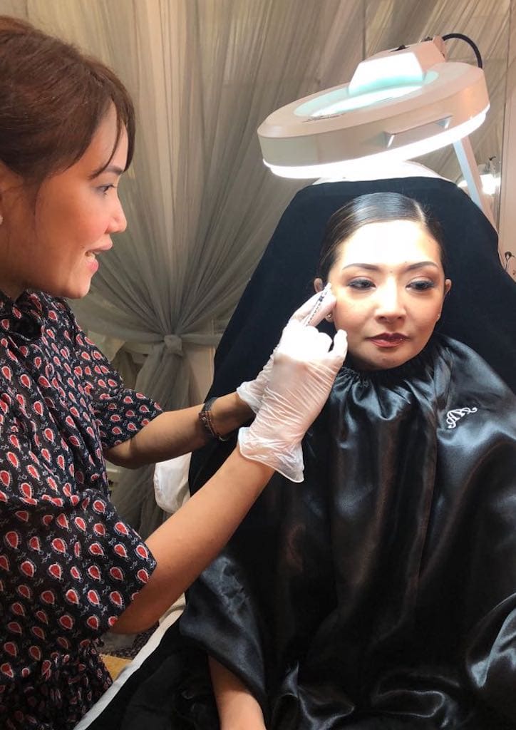 Dr. Aivee injecting Cat Antonio with Xeomin