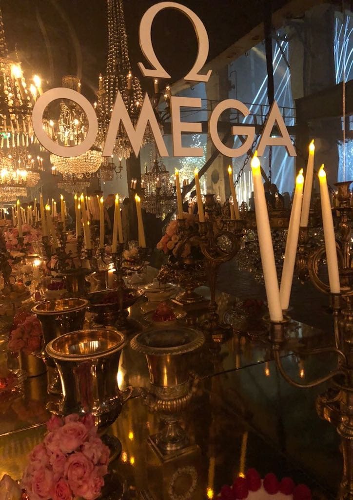 Thousands of candles flickered in dark spaces and chandeliers dropped over a table laden with sugar dreams