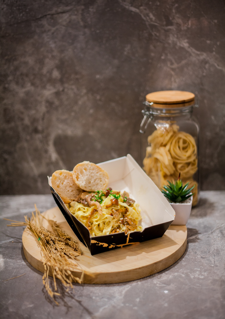 Enjoy fresh pastas tossed in a giant Grana Padano wheel