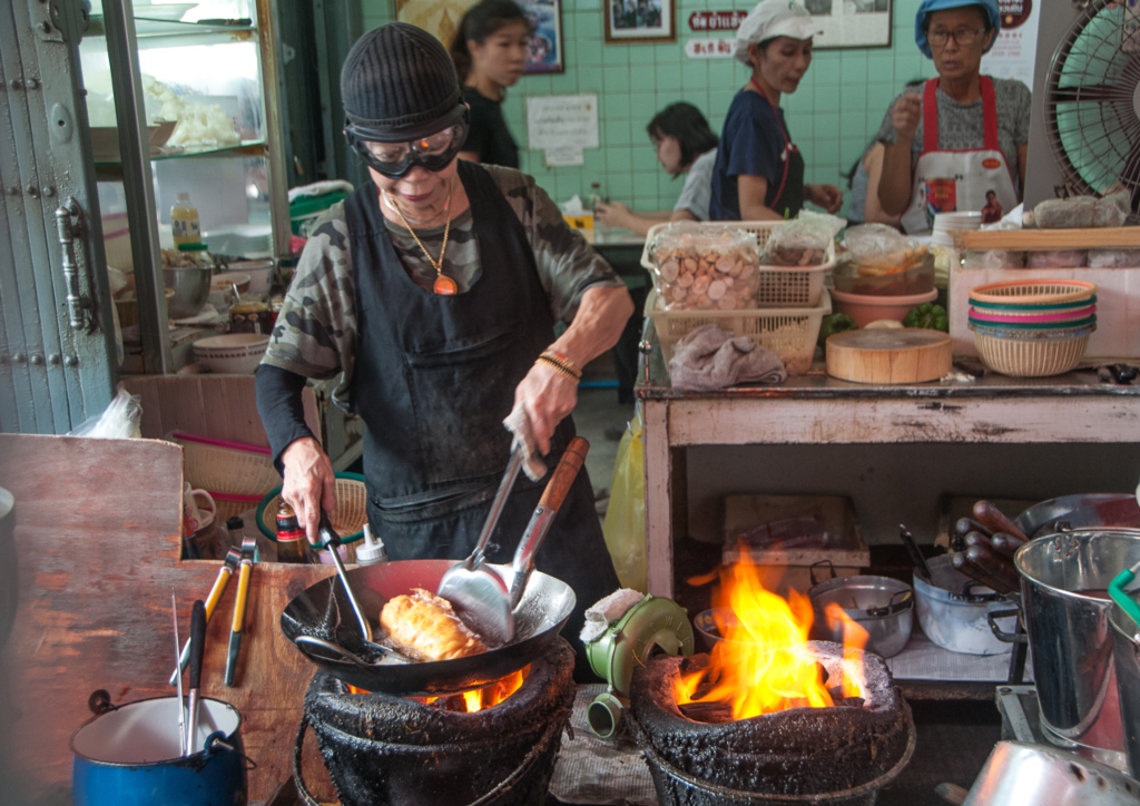 Jay Fai busy with her flaming wok