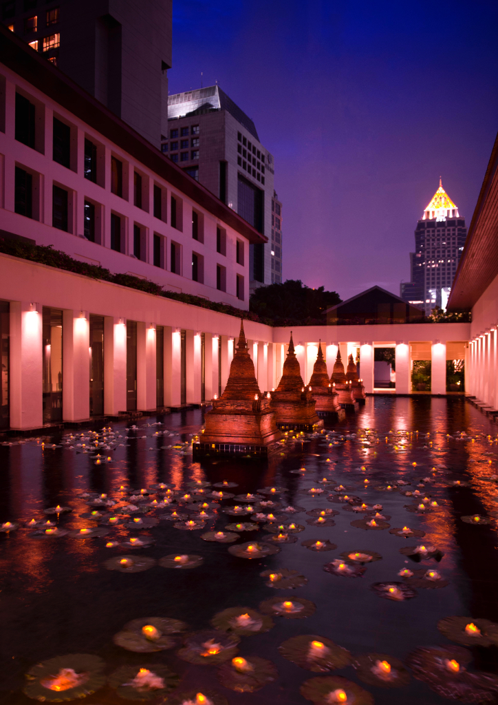 The well-lit pond at night