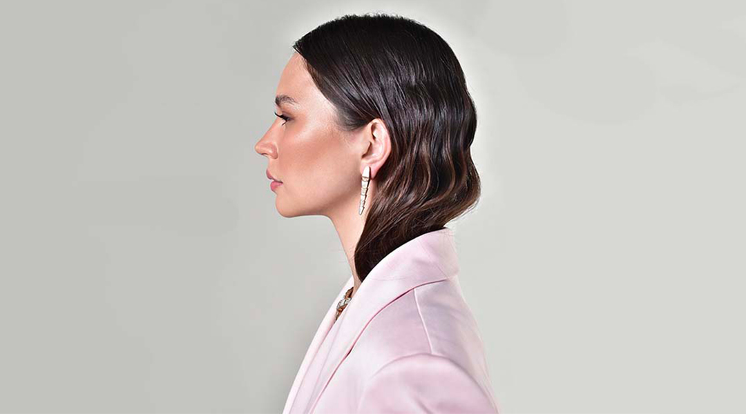 Jessica Wilson in sheer light pink coat