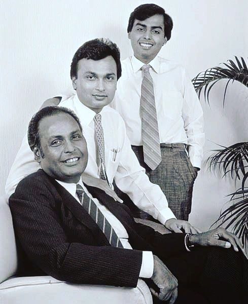 Mukesh Ambani with his father and brother