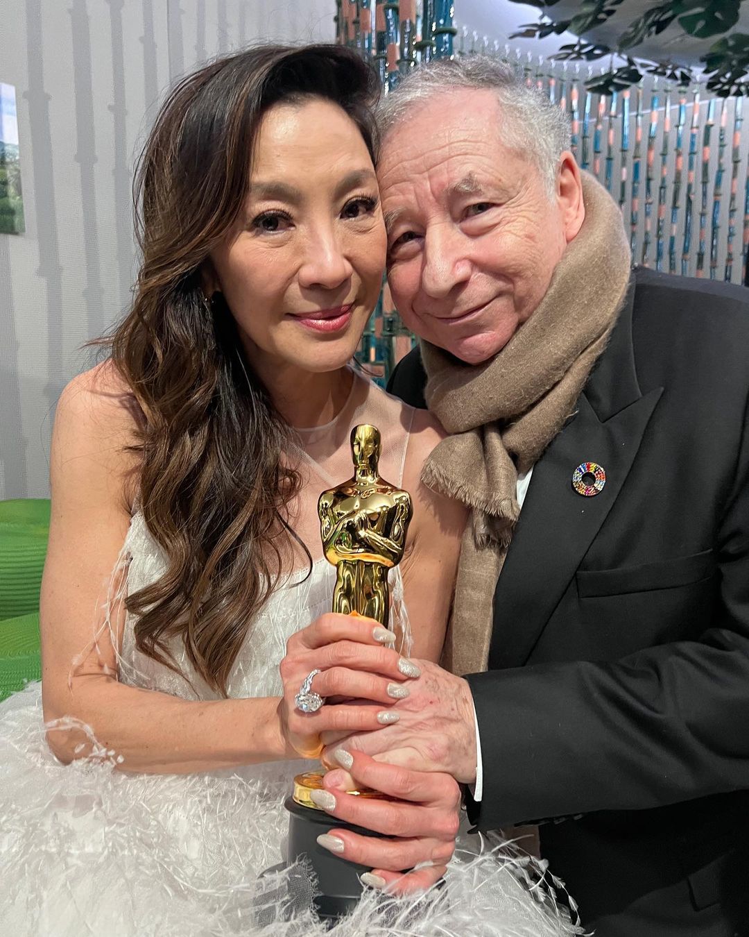 Michelle Yeoh with her husband Jean Todt and her Oscars Trophy