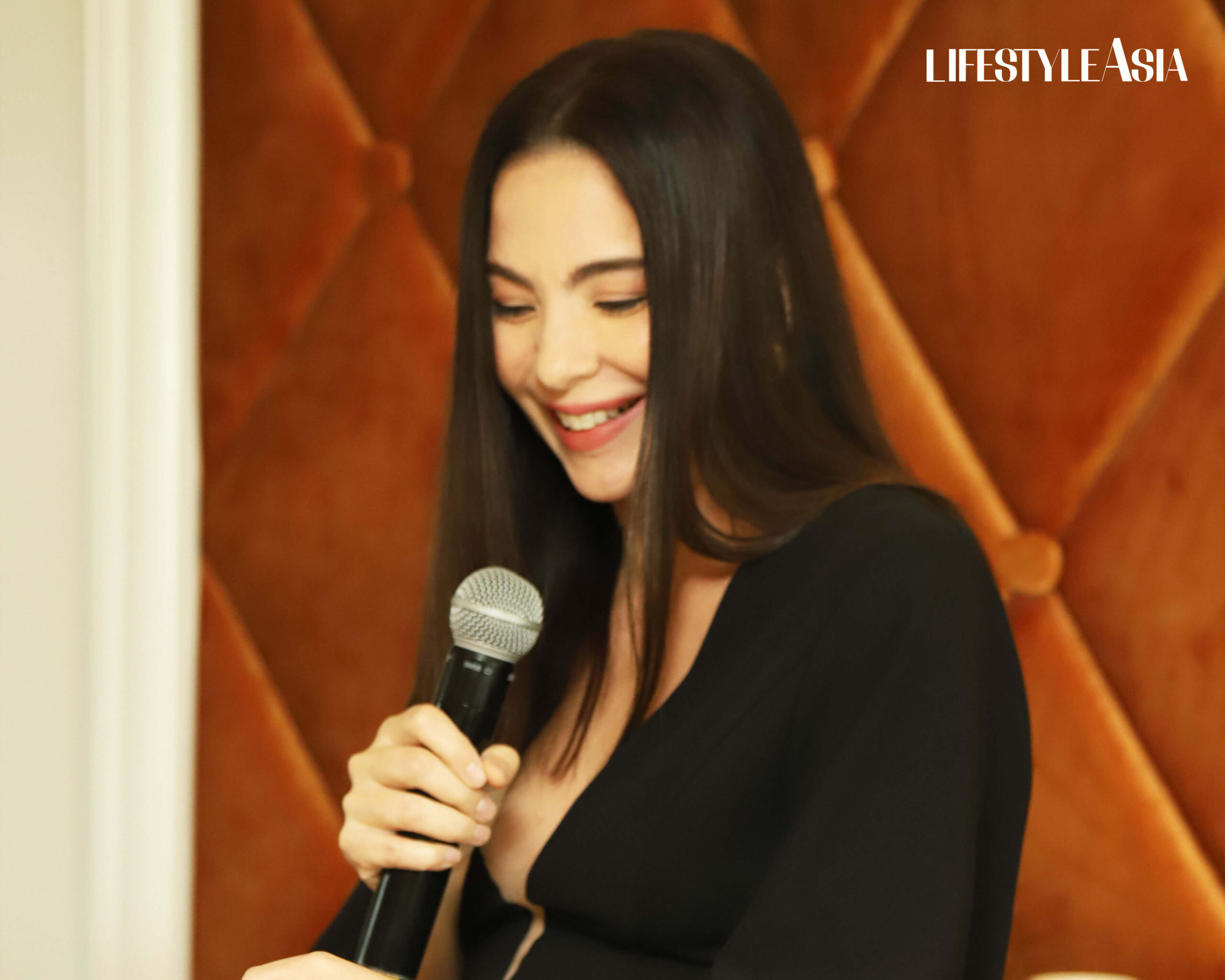 Lifestyle Asia's March cover star, Amanda Griffin Jacob, giving a speech on her advocacy