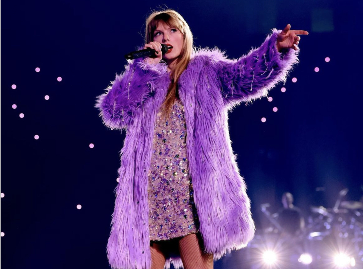 Taylor Swift in an Oscar de la Renta crystal t-shirt and faux fur coat