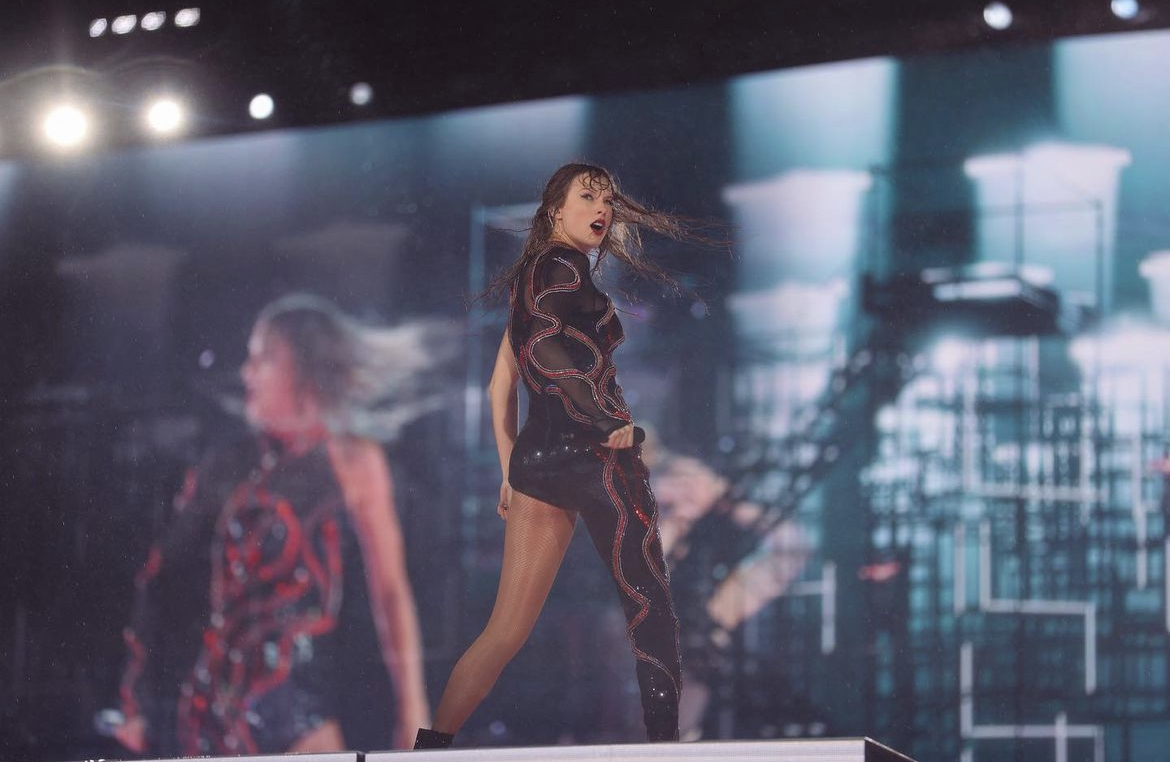 The singer wearing an edgy Roberto Cavalli catsuit embellished with snake motifs