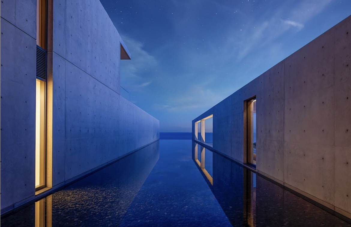 A peek at the mansion's expansive gray-toned hallways